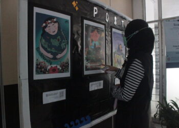 Pameran Poster Dari Lomba Kontes Fotografi dan Poster di Auditorium Unand pada Senin (21/02/2022).