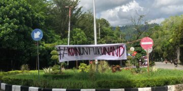 Spanduk aksi Koin Untuk Unand yang diadakan oleh AMPU, Selasa (28/6/2022)